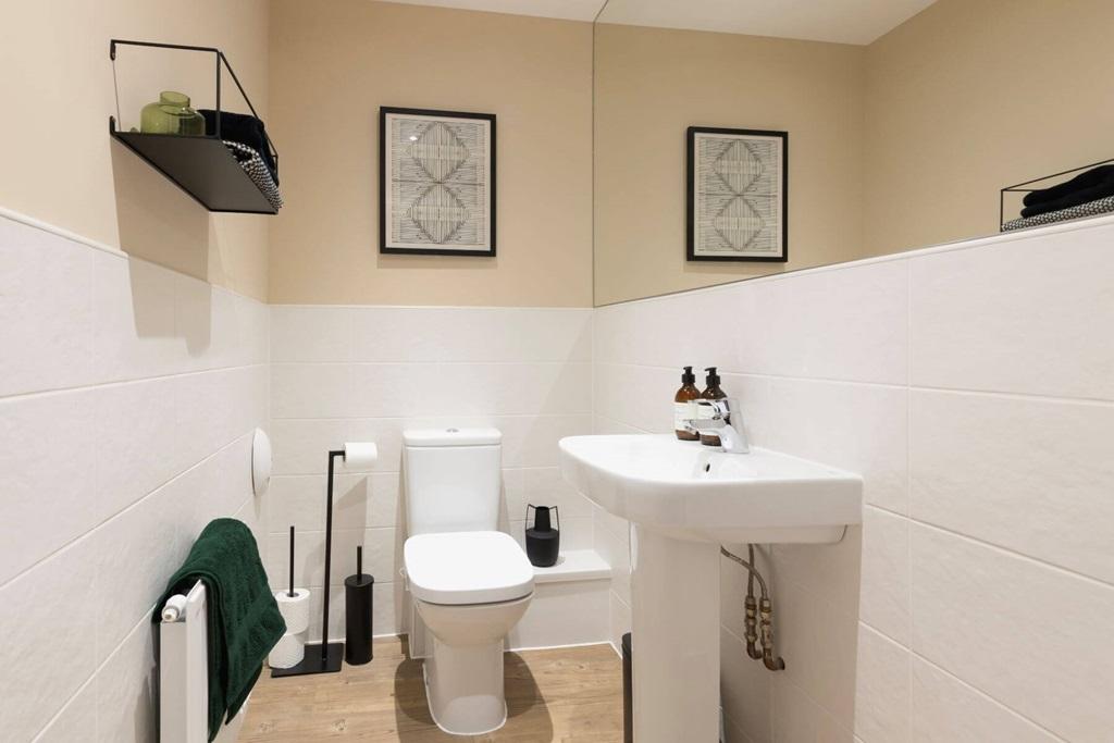 A guest cloakroom completes the home