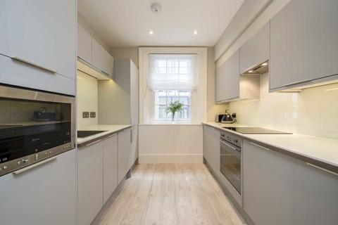 Flat 3, 48 Maddox Street, London, W1S 1AY