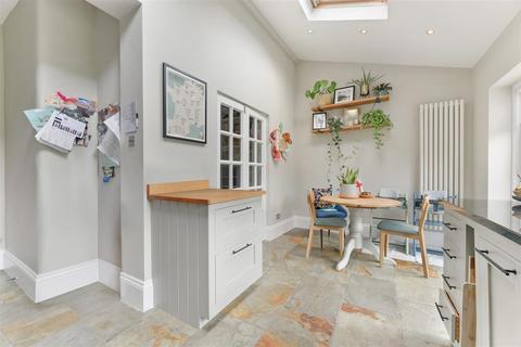 104 Effra Road, London, SW19 8PR