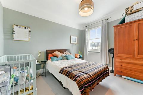 104 Effra Road, London, SW19 8PR