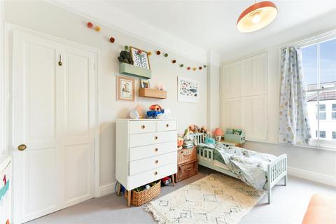 104 Effra Road, London, SW19 8PR