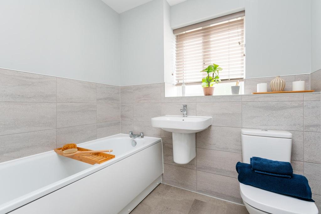 A family bathroom completes the first floor