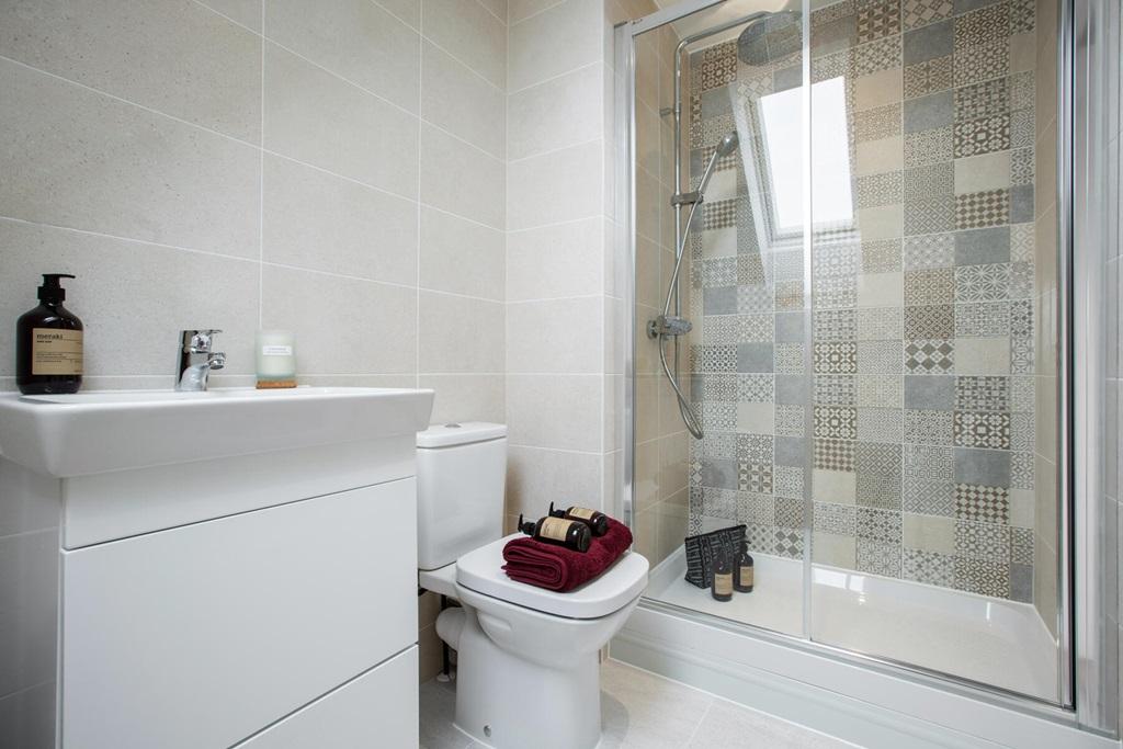 The en suite features a large double shower