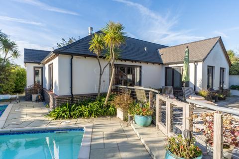 4 bedroom bungalow for sale, Park Estate, La Route Des Genets, St Brelade, Jersey. JE3 8EQ