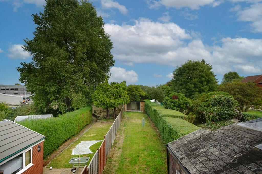 A spacious and well maintained garden with lush...