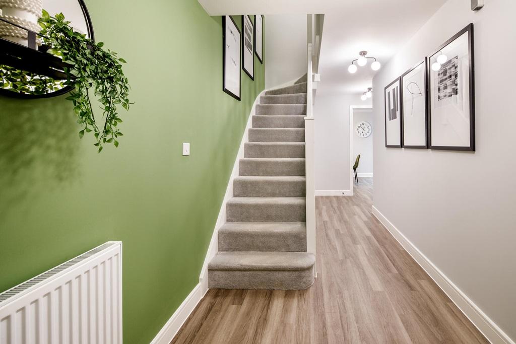 Bright and spacious hallway with under stair...