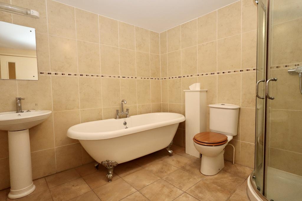 Ground floor bathroom with separate shower