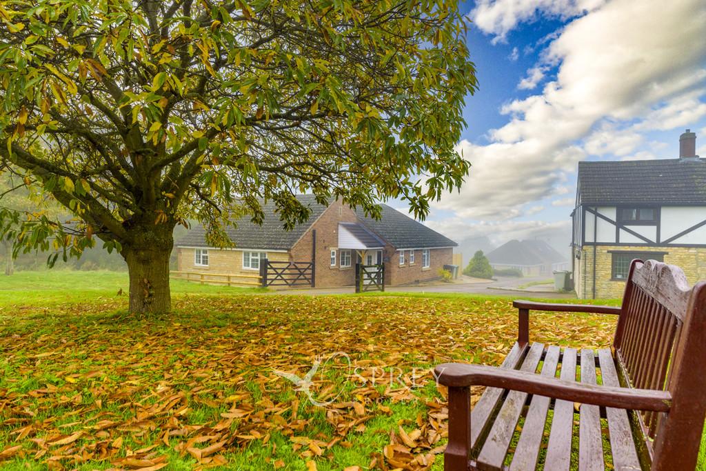 View of the Bungalow over the Green