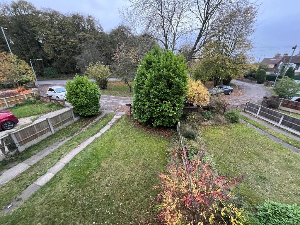 Front garden view and crescent from bedroom.jpg