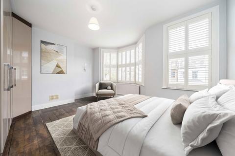 64 Hamilton Road, London, SW19 1JF