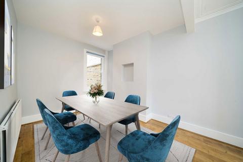 64 Hamilton Road, London, SW19 1JF