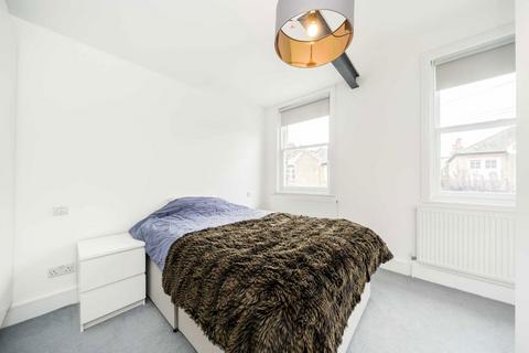 52b Gladstone Road, London, SW19 1QT
