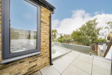 52b Gladstone Road, London, SW19 1QT