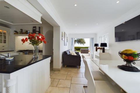 undefined, A Coastal Home With Substantial Airbnb Income