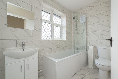 59 Medina Avenue, Esher, KT10 9TJ