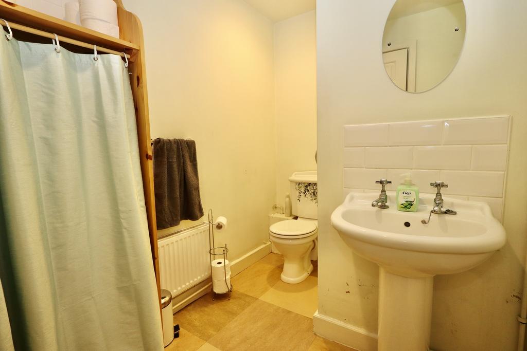 Cloakroom (formerly a shower room)