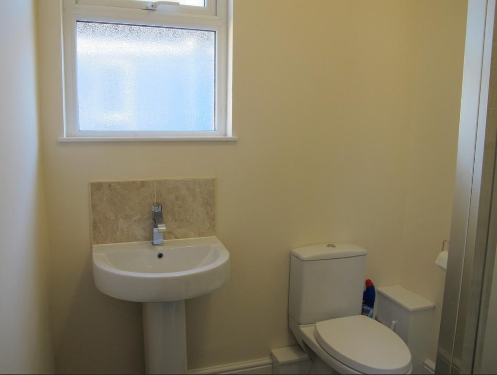 A clean and well maintained bathroom featuring ...