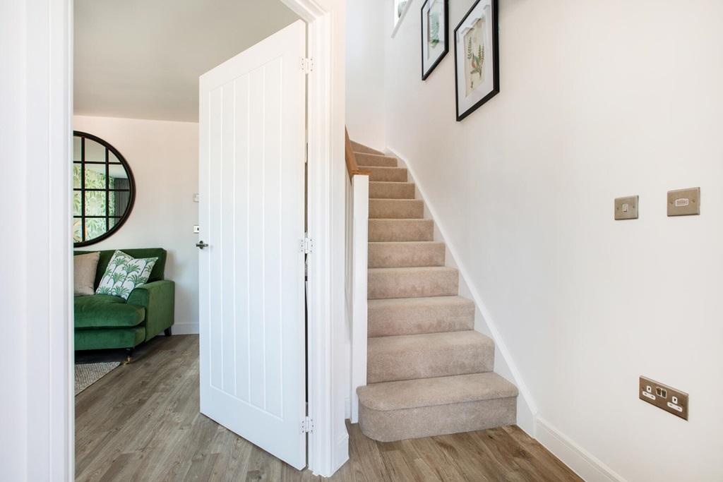 Bright hallway leading to the lounge