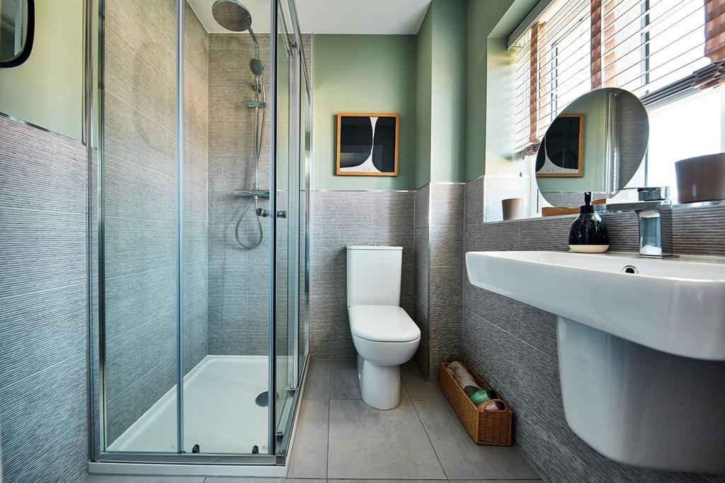 A well proportioned en-suite sits off the main...