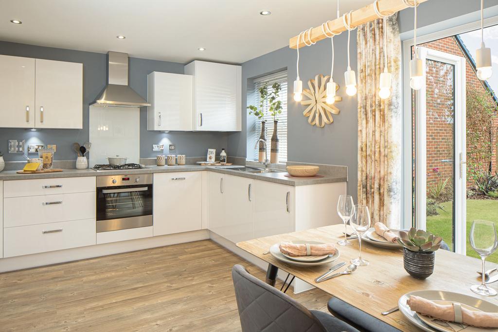 Kitchen / dining area with french doors to the...