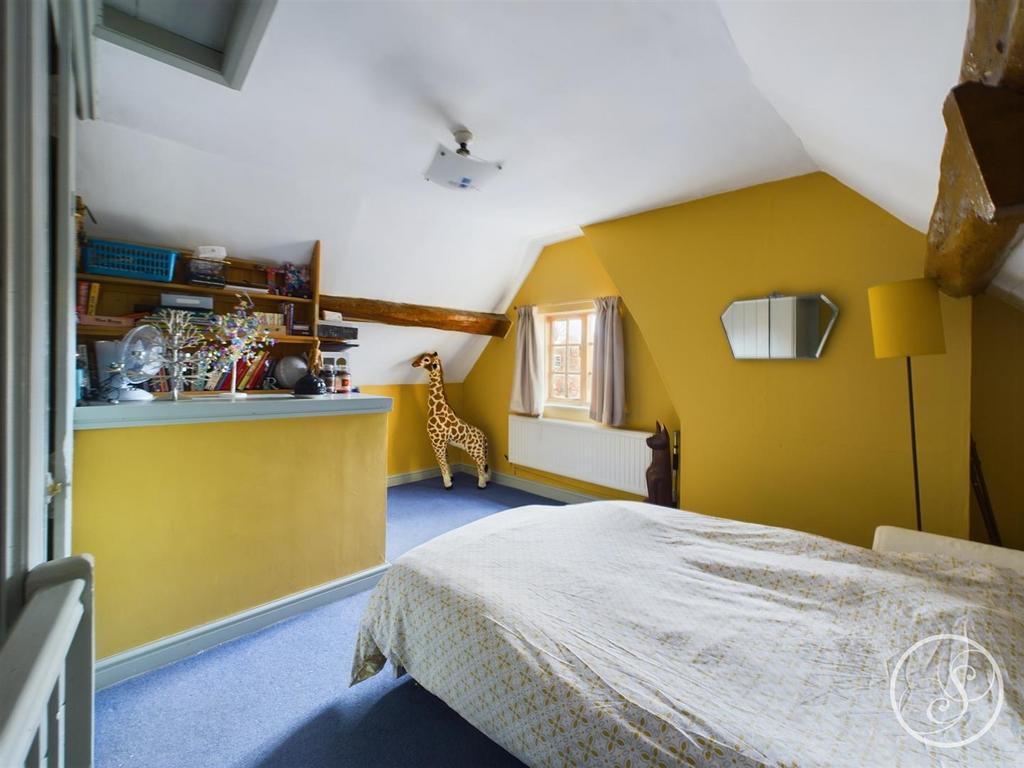 Attic room/bedroom four