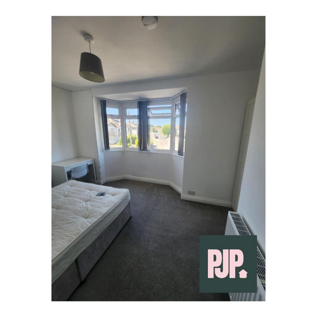 A spacious and bright large double bedroom perf...