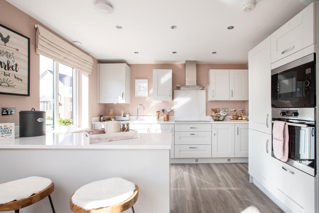 Beautifully designed kitchen with breakfast bar