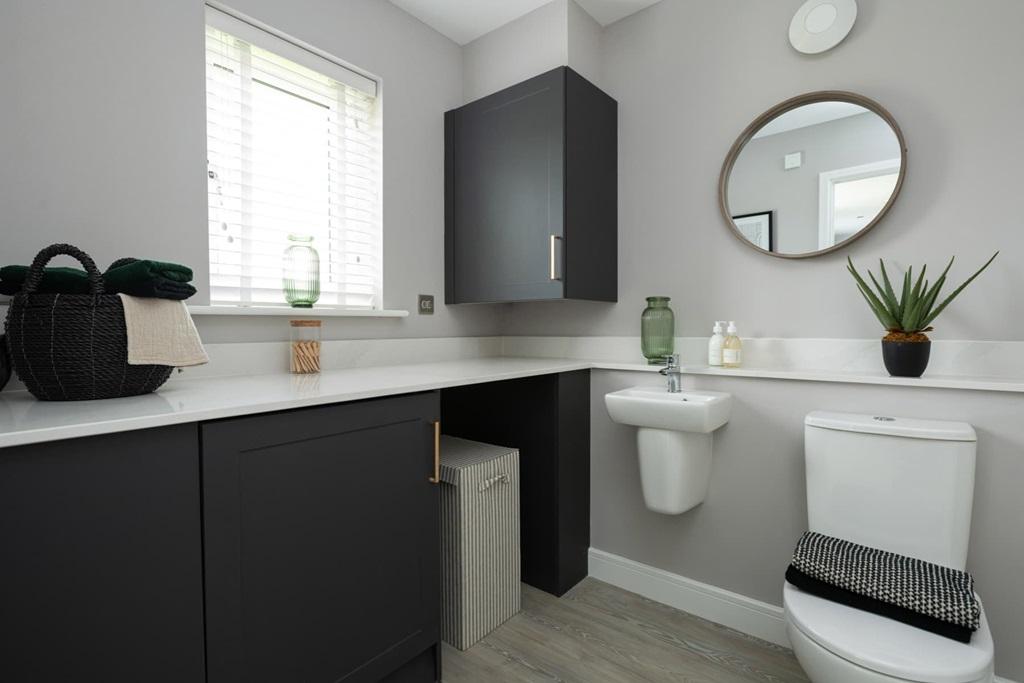 A downstairs WC &amp; utility room adds convenience