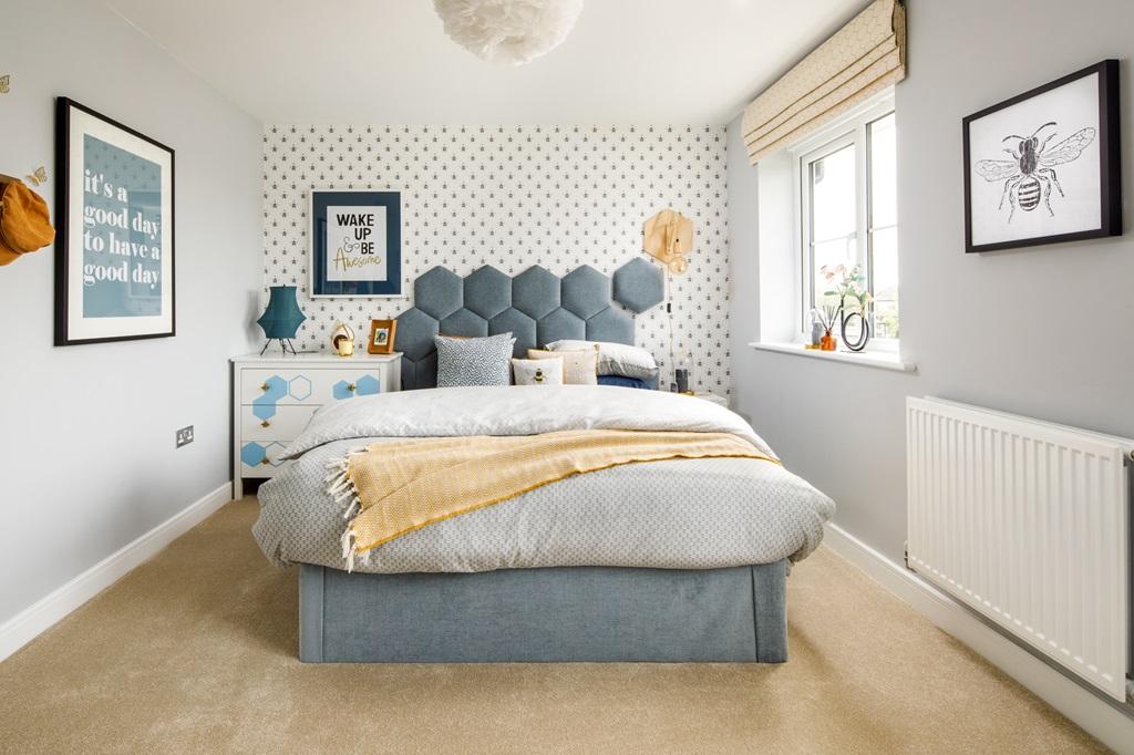 Bedroom 2 is light and airy