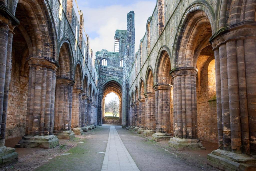 Historic Kirkstall Abbey stands nearby