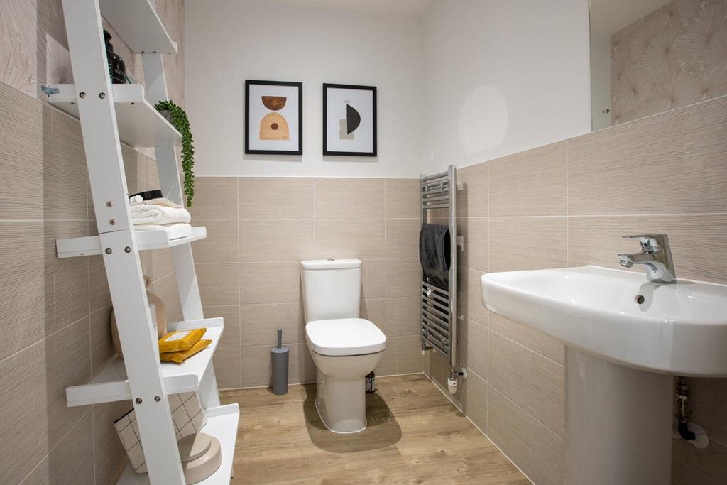 A downstairs toilet sits in the middle of the home