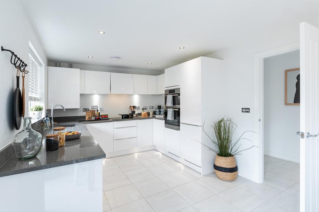 The large kitchen offers ample storage