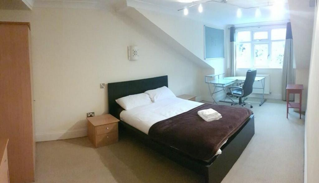 A spacious and inviting double bedroom, perfect...