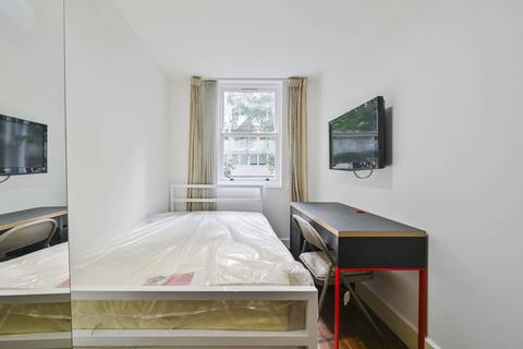 Flat 4, 22 Carburton Street, London, W1W 5AP