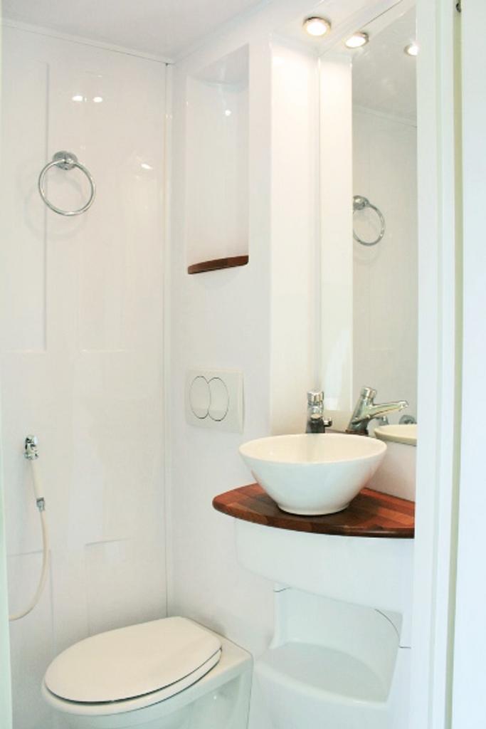 A modern and well maintained bathroom featuring...