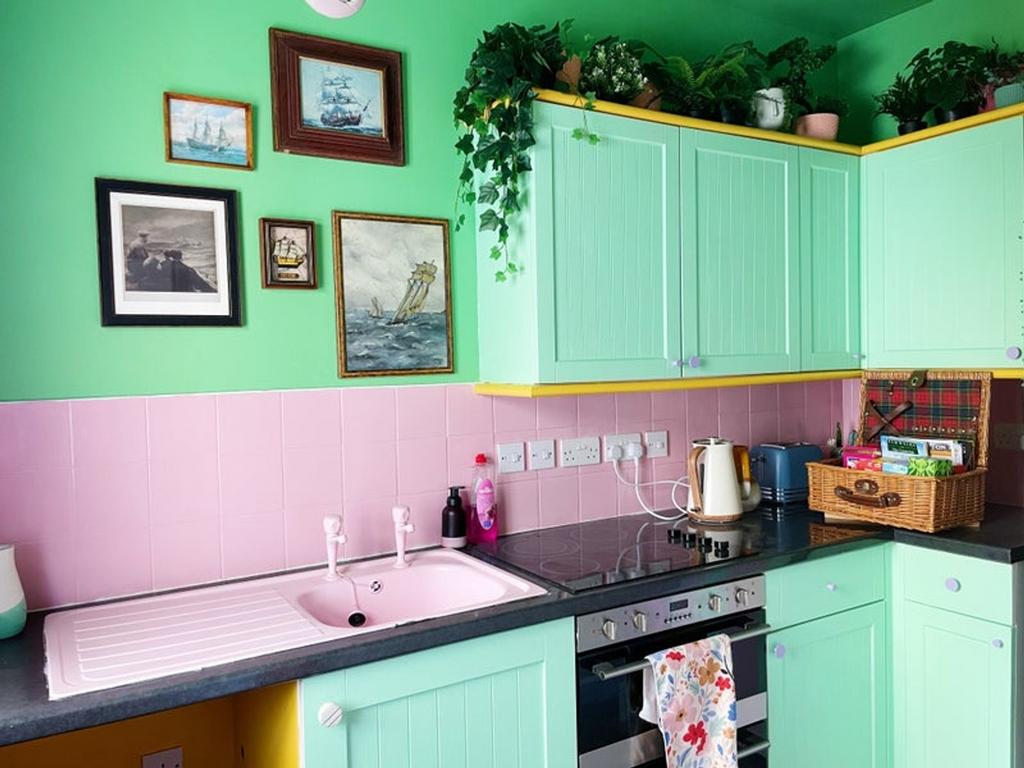 A vibrant and tidy kitchen featuring cheerful c...