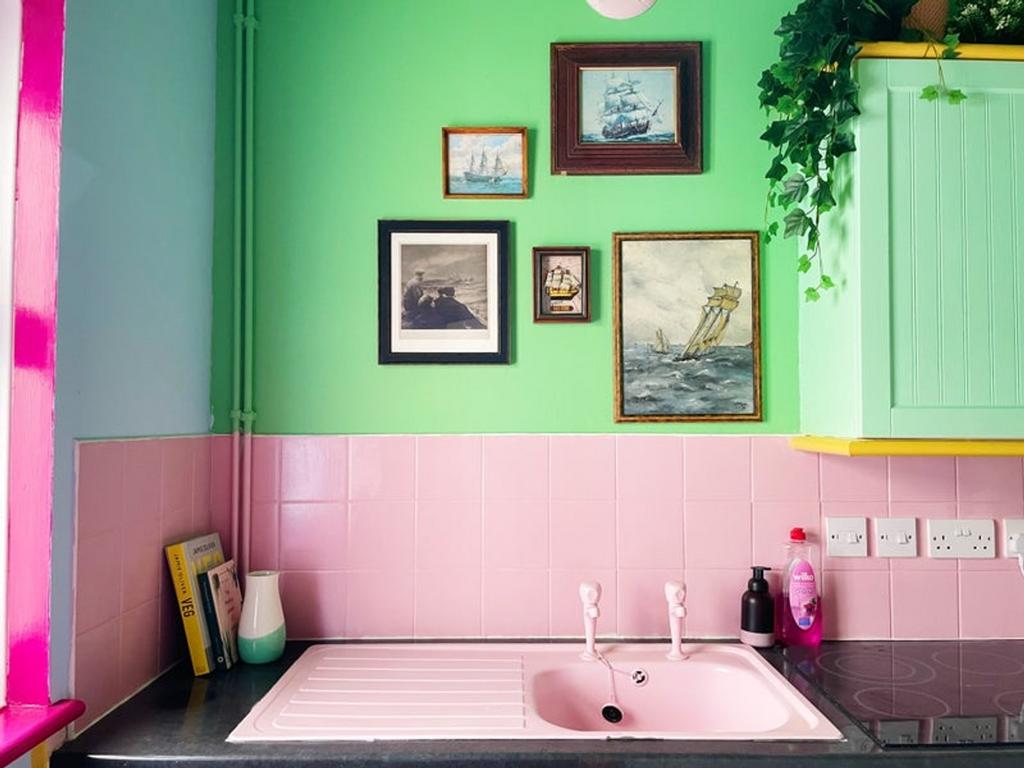 A vibrant and inviting kitchen with colorful wa...