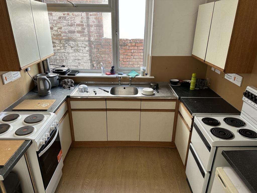 A functional kitchen with ample counter space a...