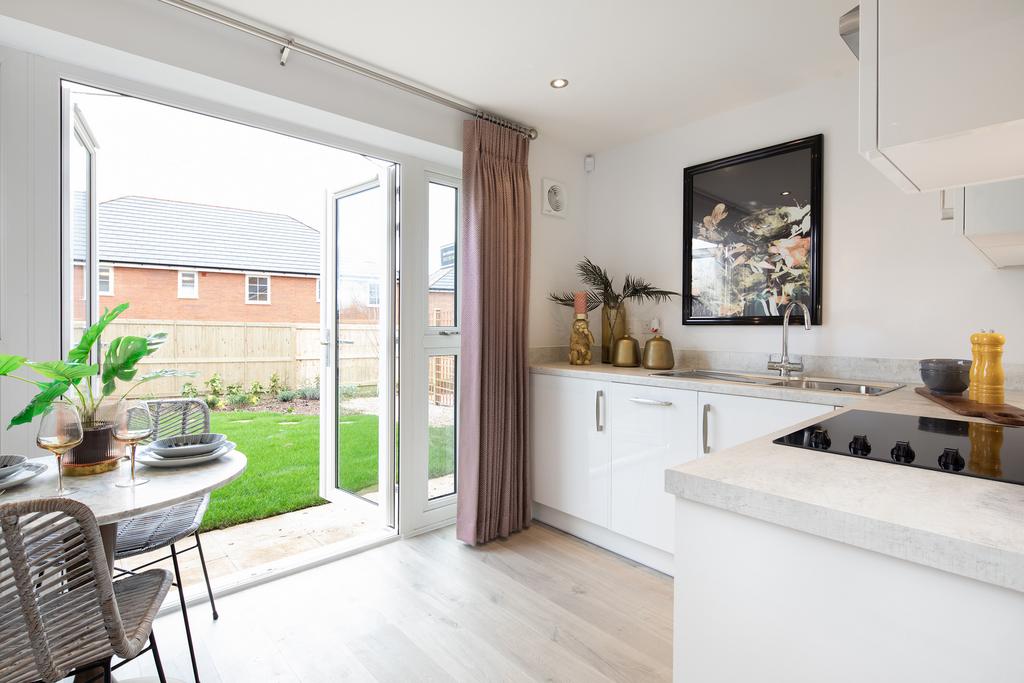 Kitchen with French doors in the Kenley 2...