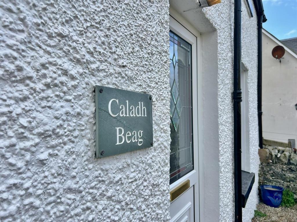 Front door and sign