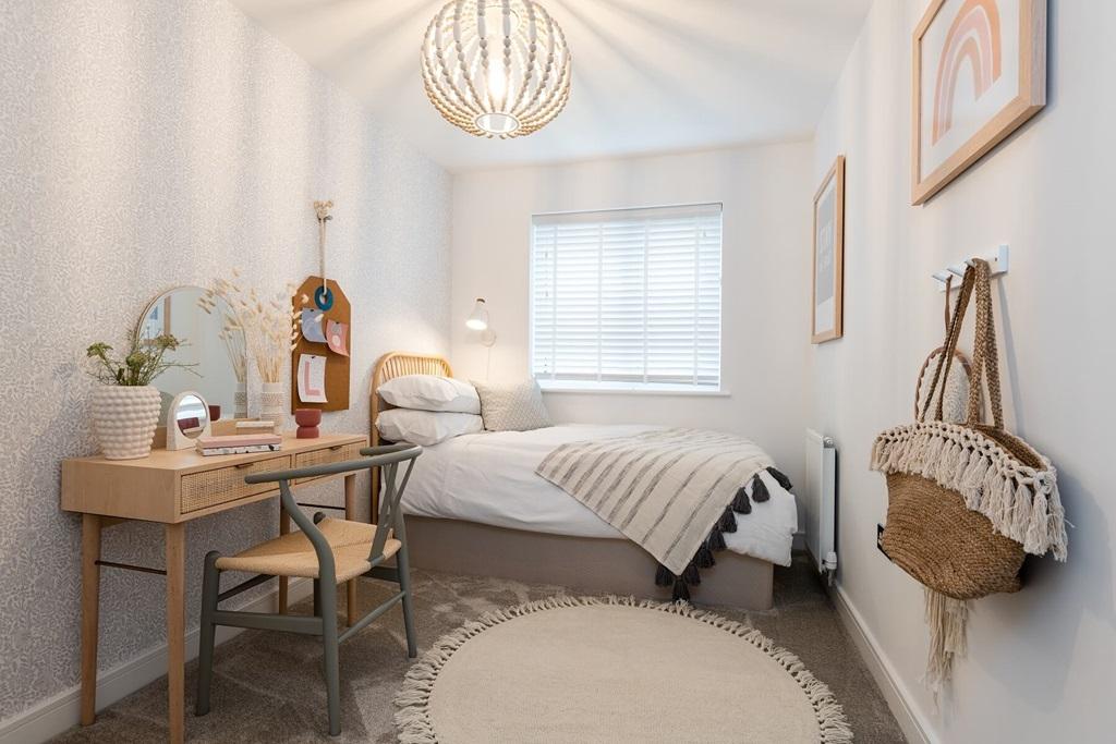 The third bedroom is well-suited to a child