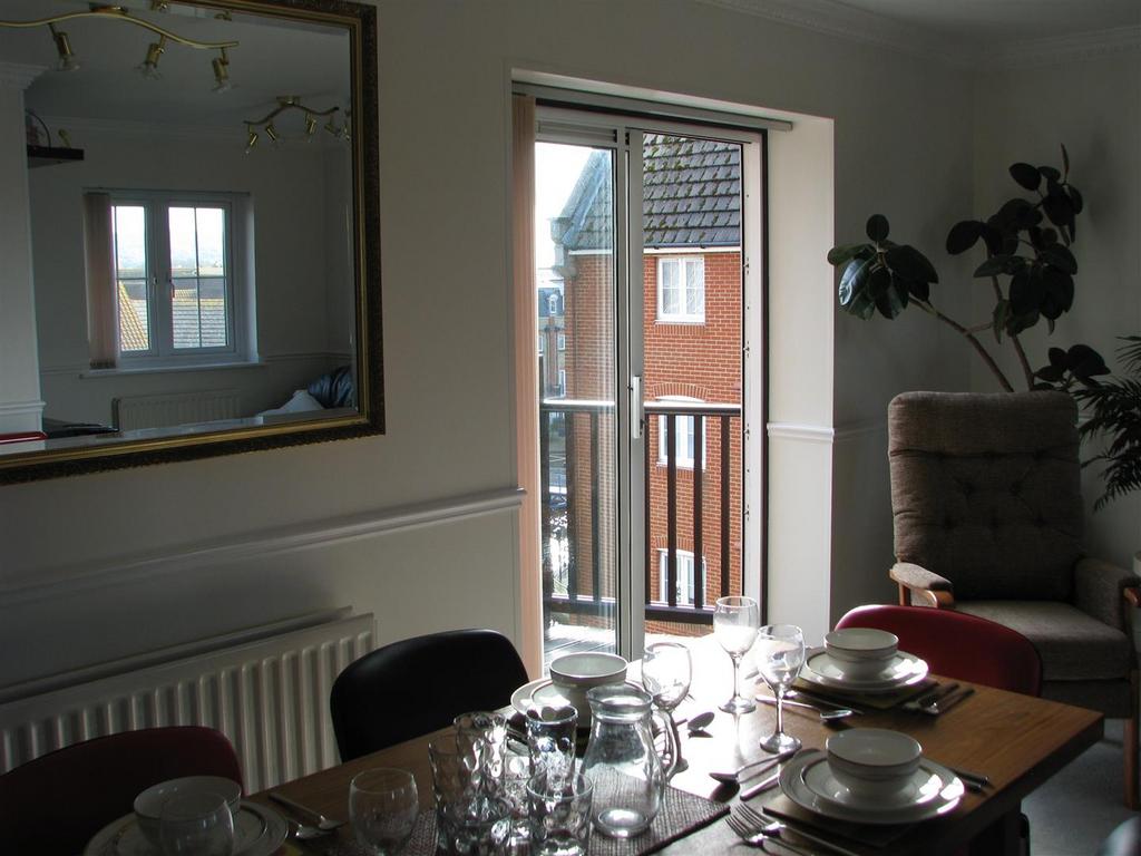 2 Dining area and balcony access.JPG