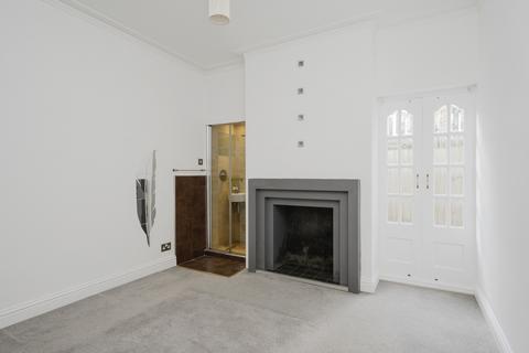 2 Ridley Road, London, SW19 1EU