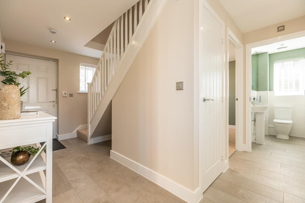 Hallway with convenient storage cupboard