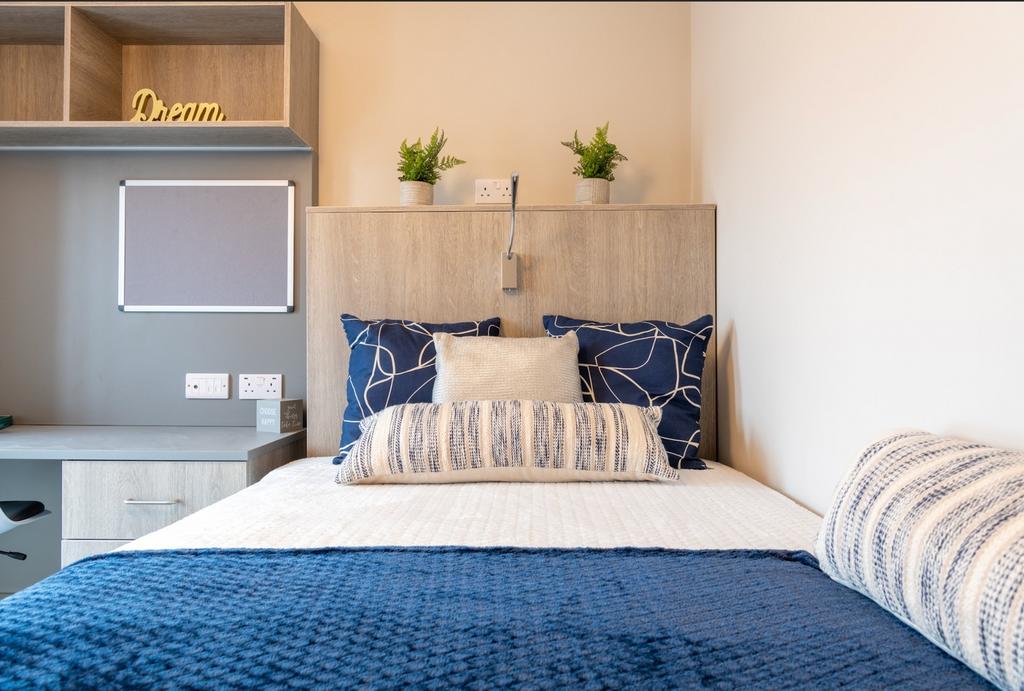 A stylish and inviting double bedroom featuring...