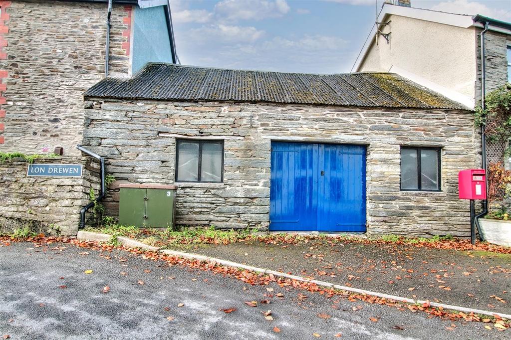 Attached former smithy