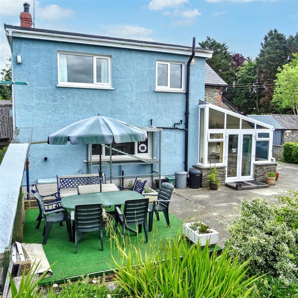 Rear of property with patio