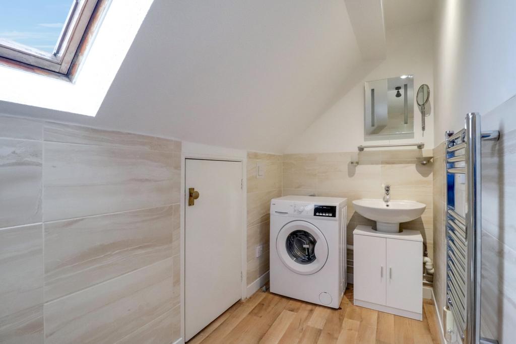 Bathroom showing utility area