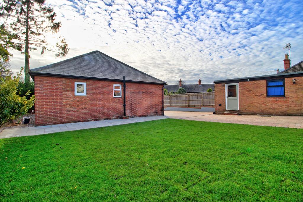 Recent landscaping (showing detached garage)