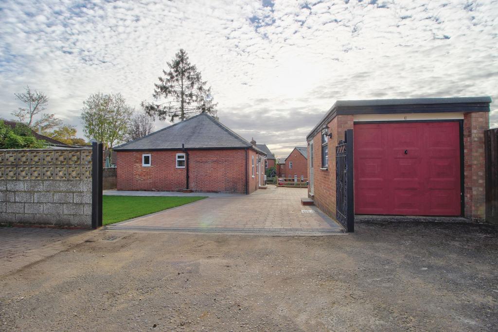 Rear driveway and garage